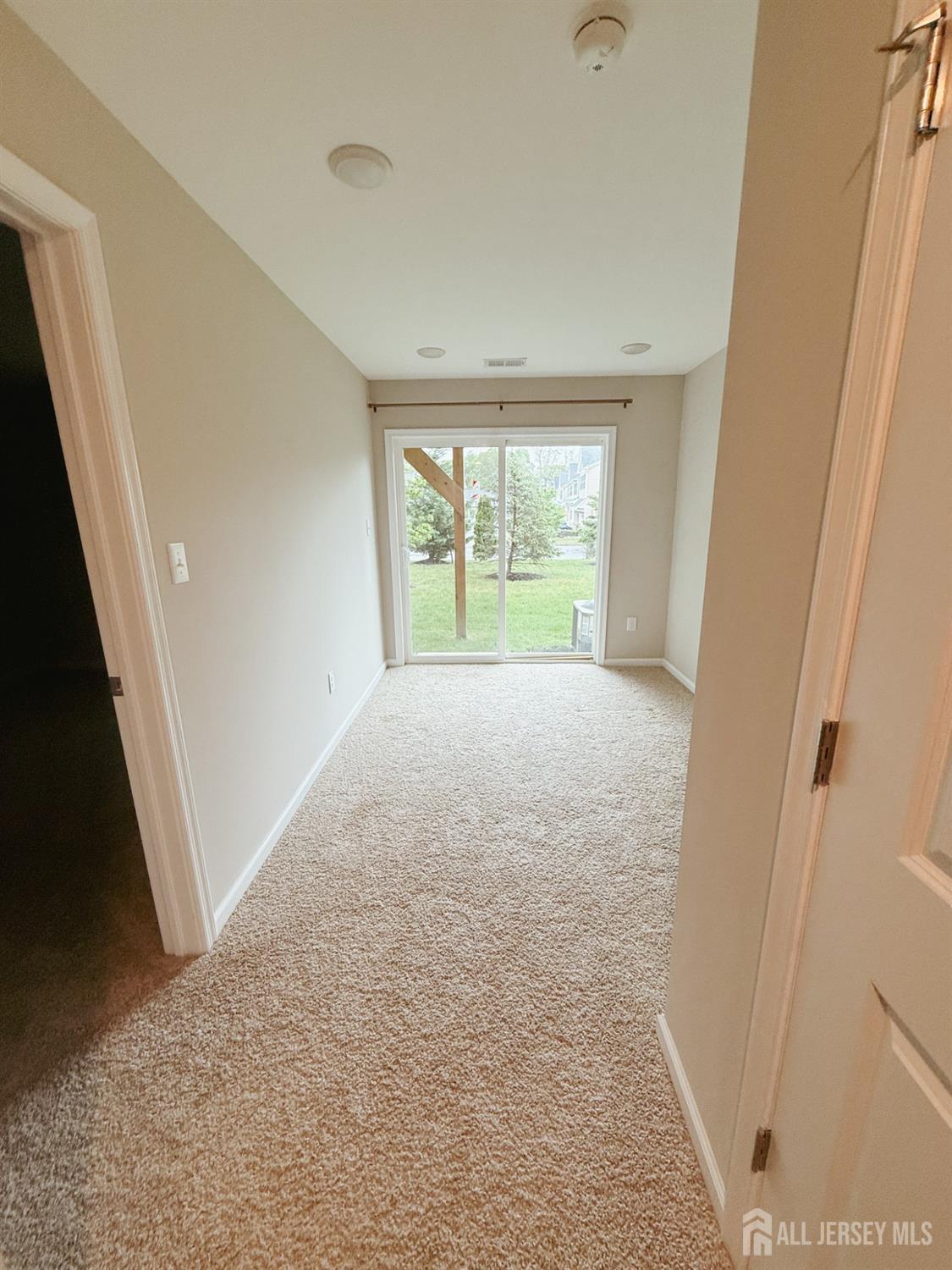 1101 Hights Farm Road North Monroe Township, NJ 08831 - Photo 3 of 38 a view of an empty room with a window