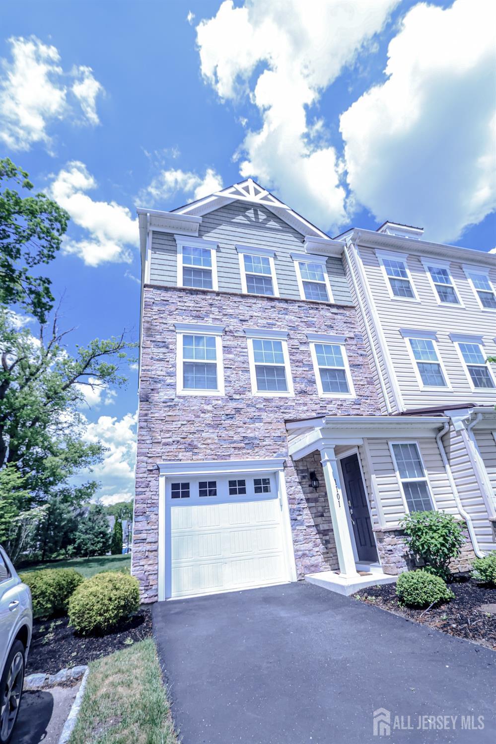 1101 Hights Farm Road North Monroe Township, NJ 08831 - Photo 34 of 38 a front view of a building with garden