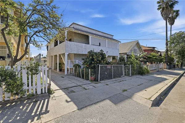a front view of a house with yard