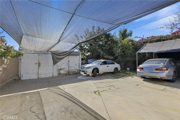 a view of a cars parked in garage