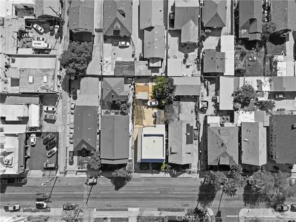 an aerial view of a house with outdoor space