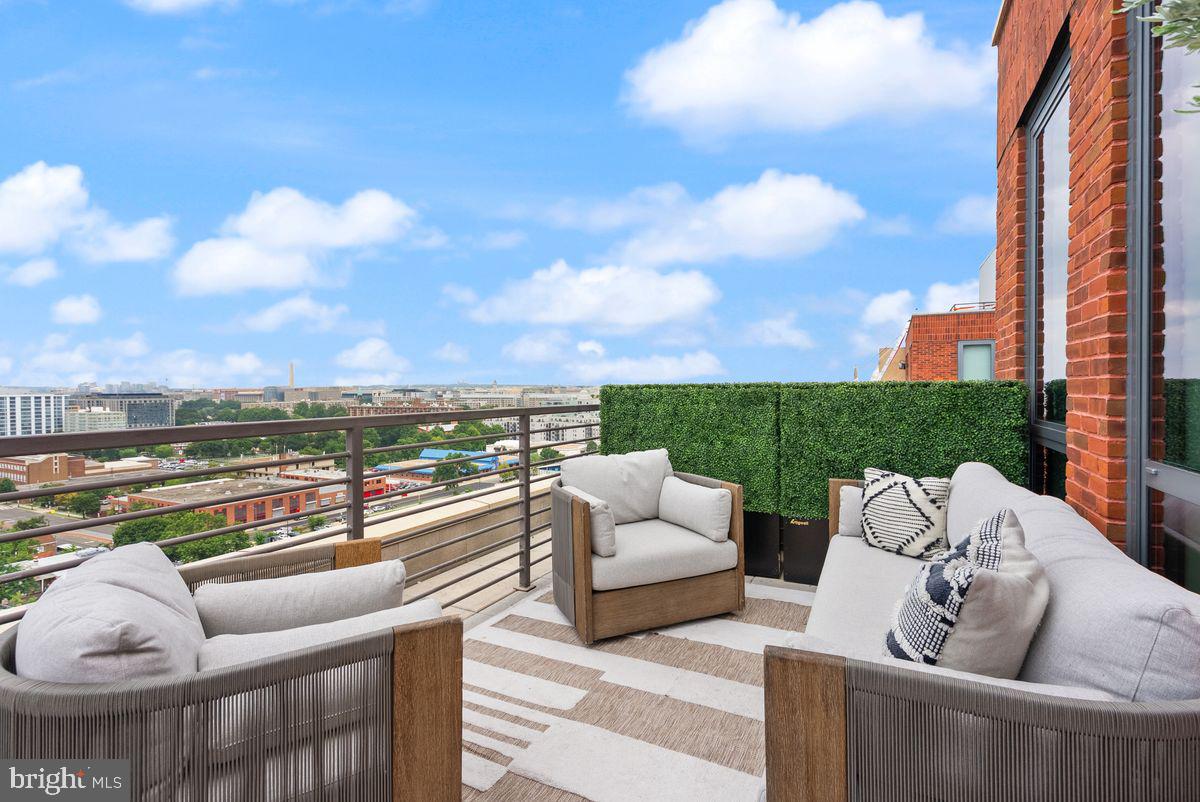 1211 Van Street Southeast, Unit PH13B Washington, DC 20003 - Photo 21 of 25 a view of a terrace with couches