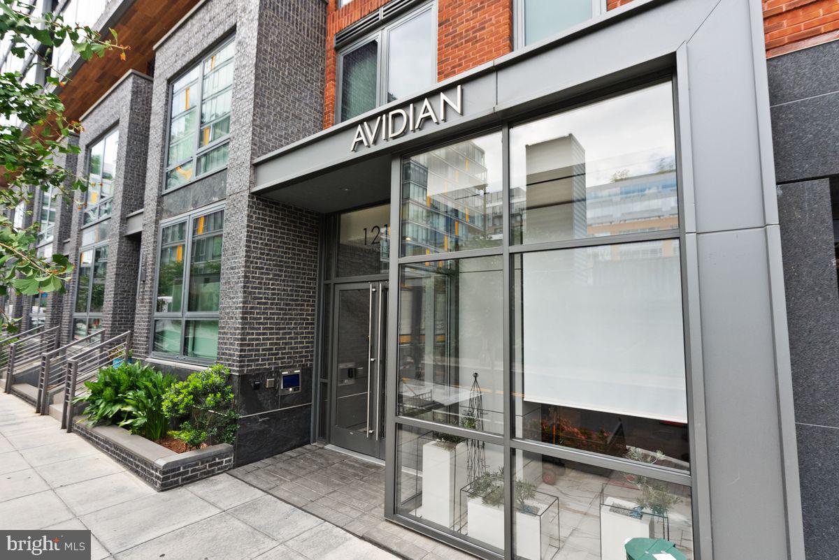 1211 Van Street Southeast, Unit PH13B Washington, DC 20003 - Photo 24 of 25 a outdoor view of a building with a potted plant from a window
