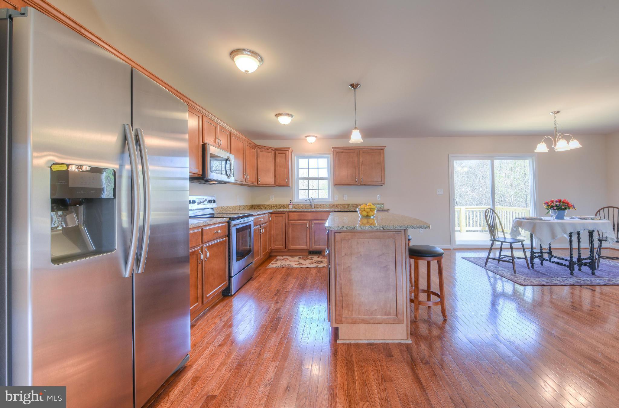 12163 Ridge Road King George, VA 22485 - Photo 12 of 30 KITCHEN W/ HARDWOOD