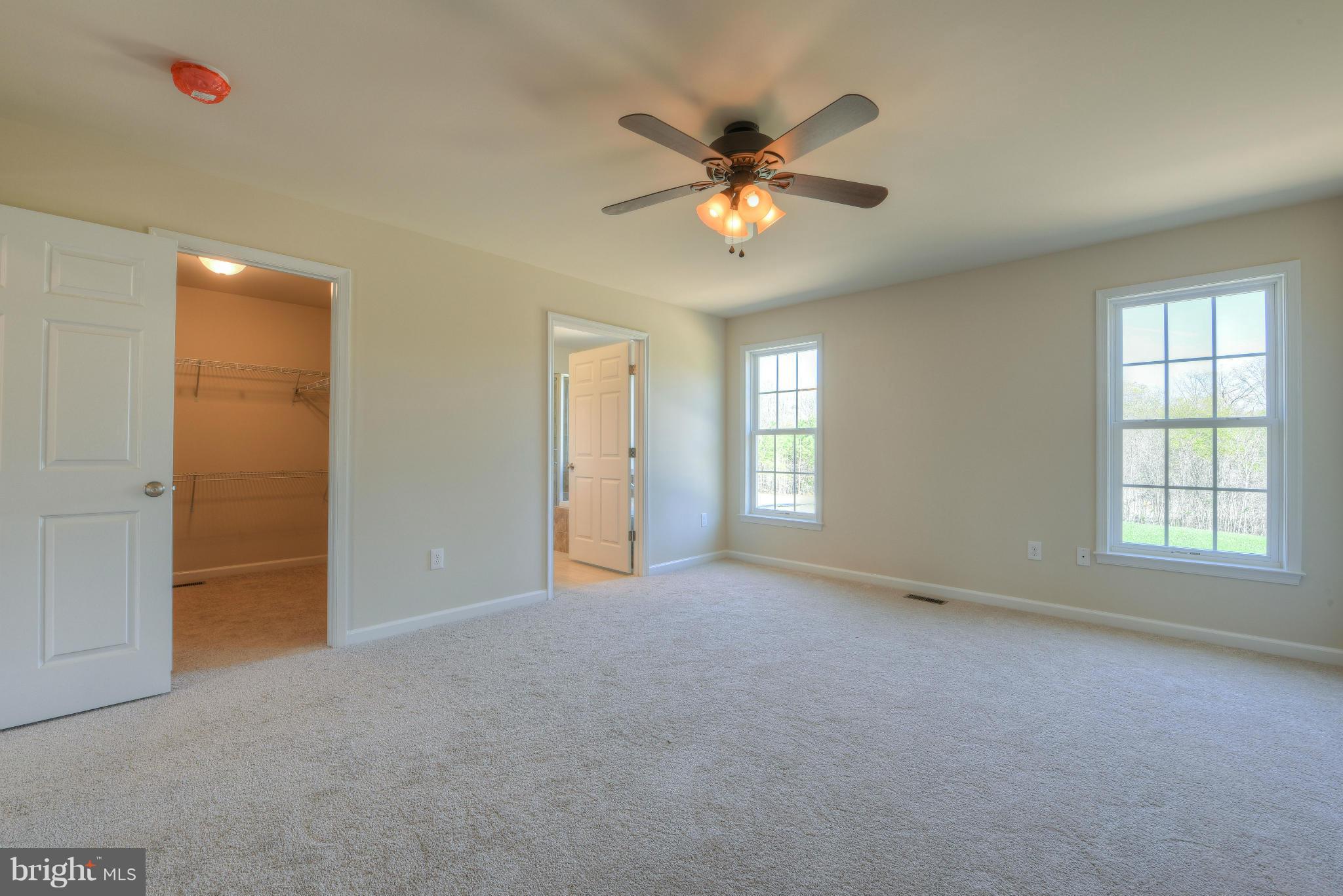 12163 Ridge Road King George, VA 22485 - Photo 26 of 30 OODLES OF STORAGE IN THE MASTER CLOSET