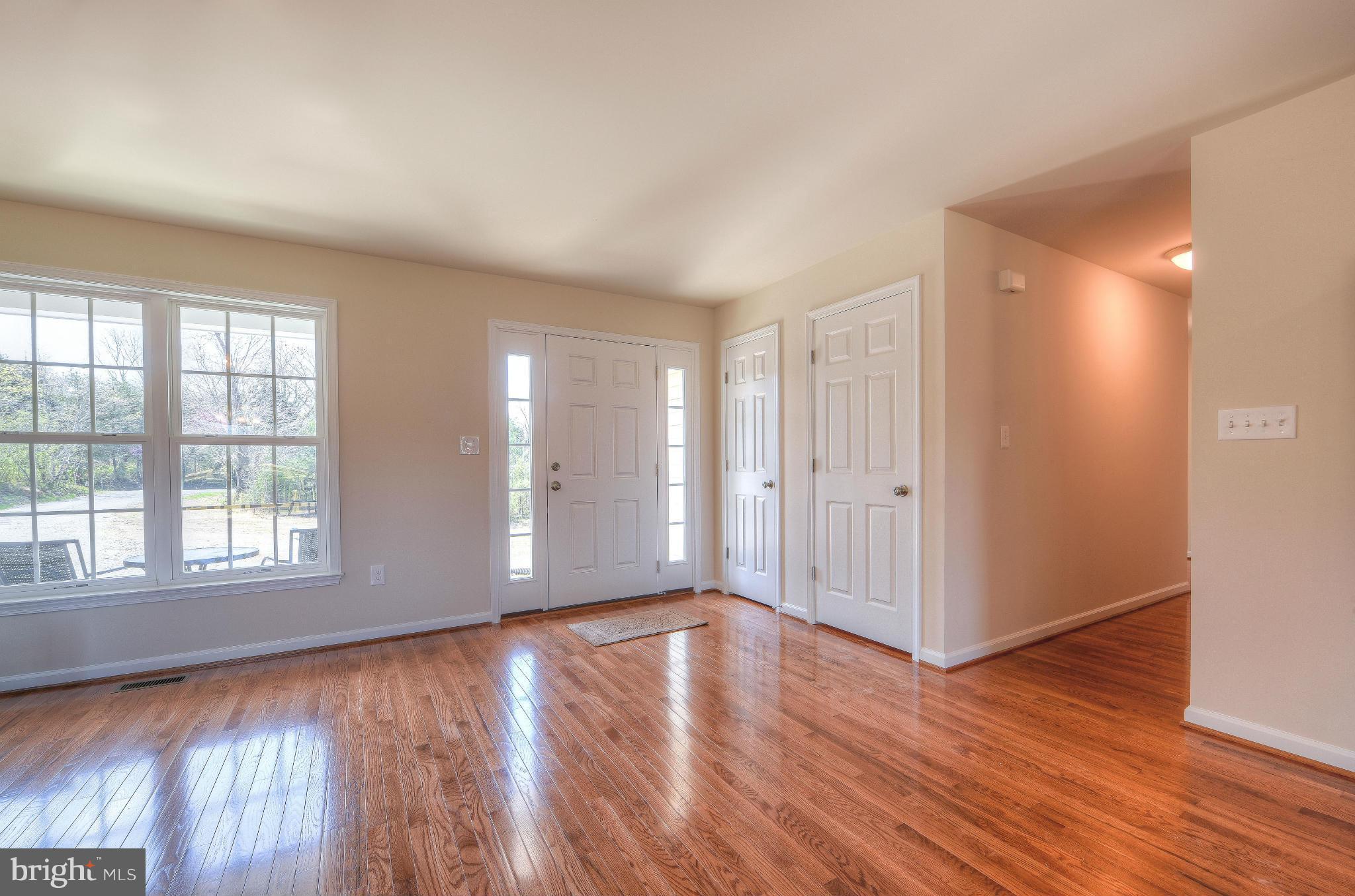 12163 Ridge Road King George, VA 22485 - Photo 10 of 30 SPACIOUS FAMILY ROOM W/ HARDWOOD FLOORS
