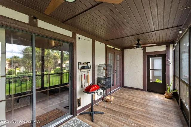 a view of a porch with a yard