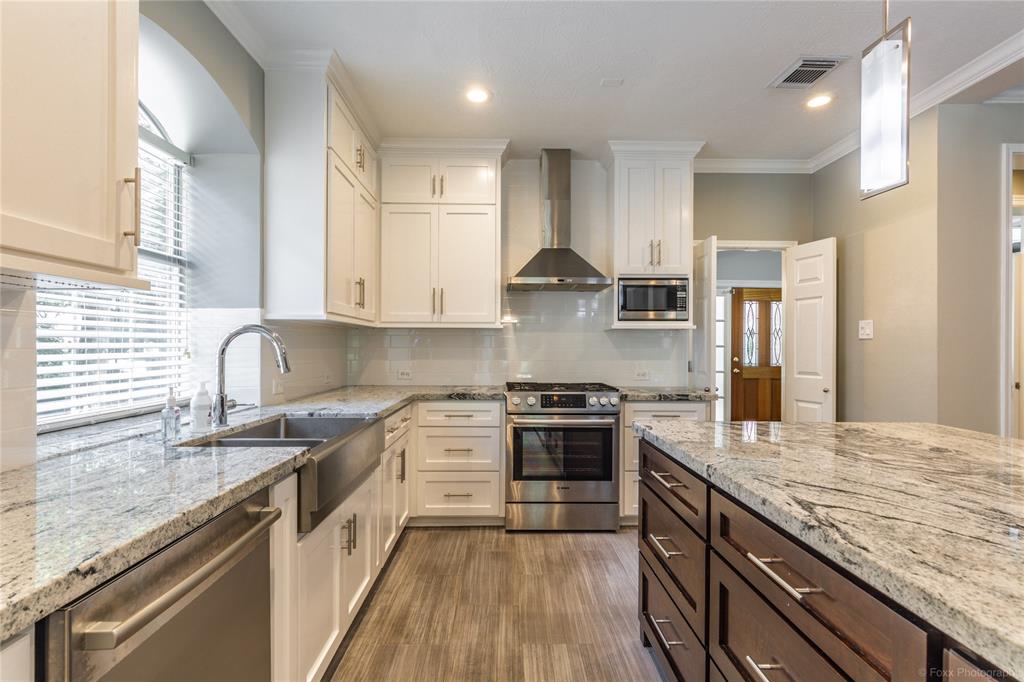 Totally remodeled kitchen with custom granite counters, farmers depth sink and top of the line appliances.