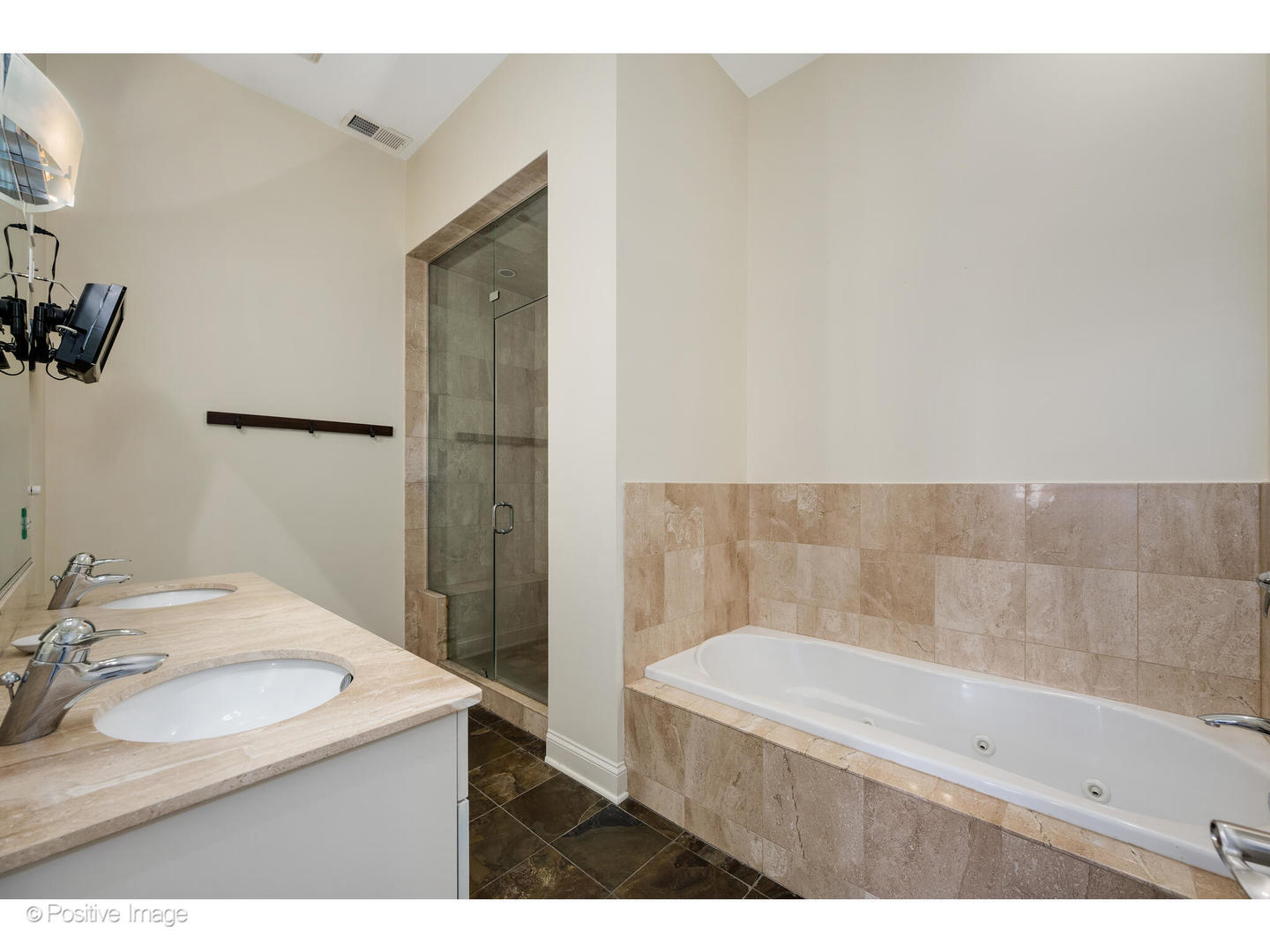 955 West Monroe Street, Unit 4A Chicago, IL 60607 - Photo 15 of 24 a bathroom with a sink and a mirror