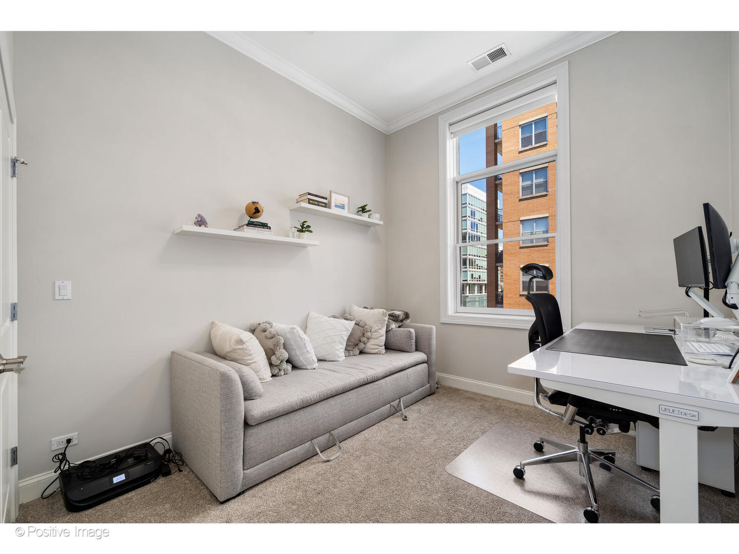 955 West Monroe Street, Unit 4A Chicago, IL 60607 - Photo 18 of 24 a living room with furniture and a window