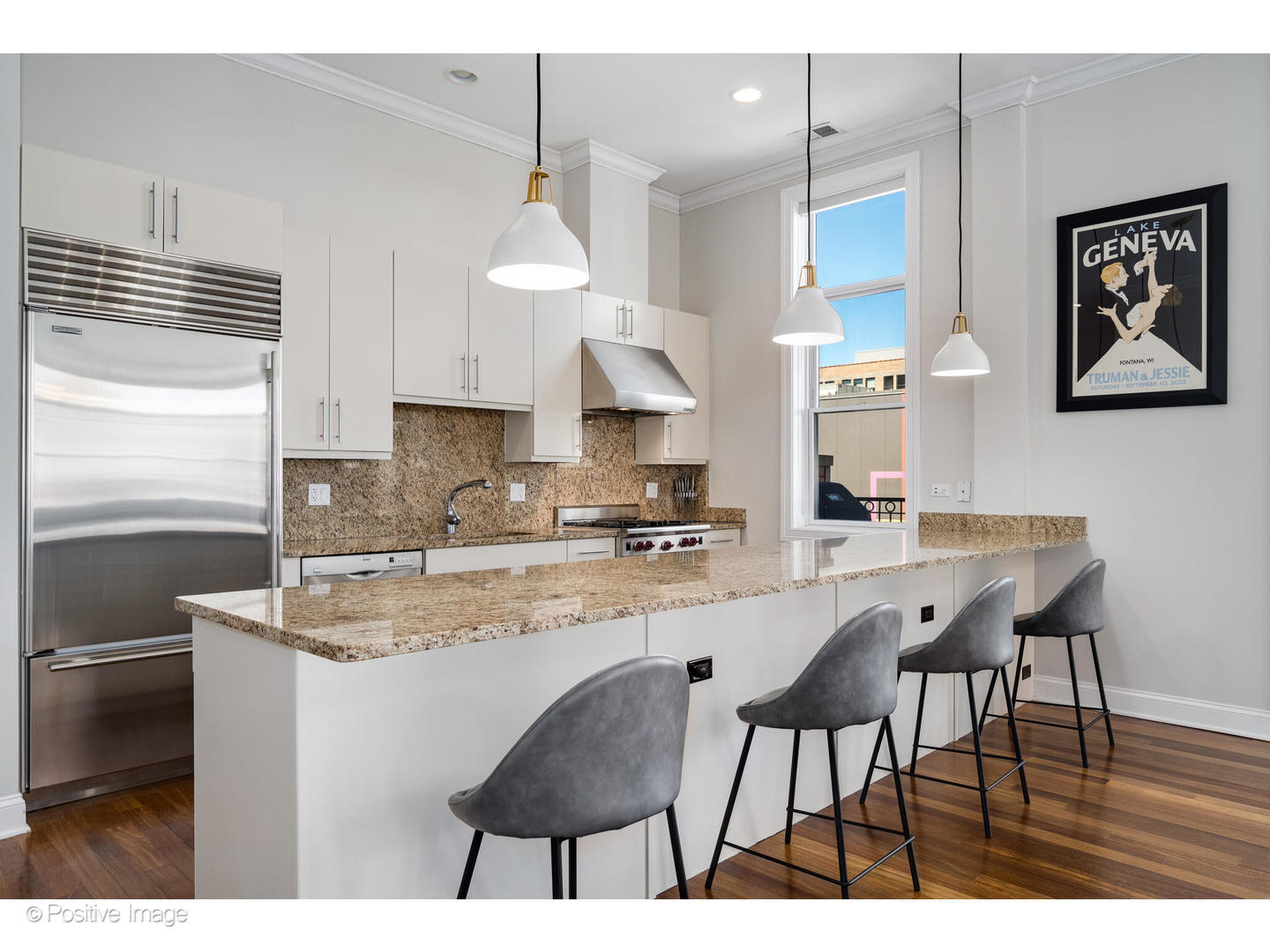 955 West Monroe Street, Unit 4A Chicago, IL 60607 - Photo 5 of 24 a kitchen with stainless steel appliances granite countertop a sink a stove a refrigerator and island
