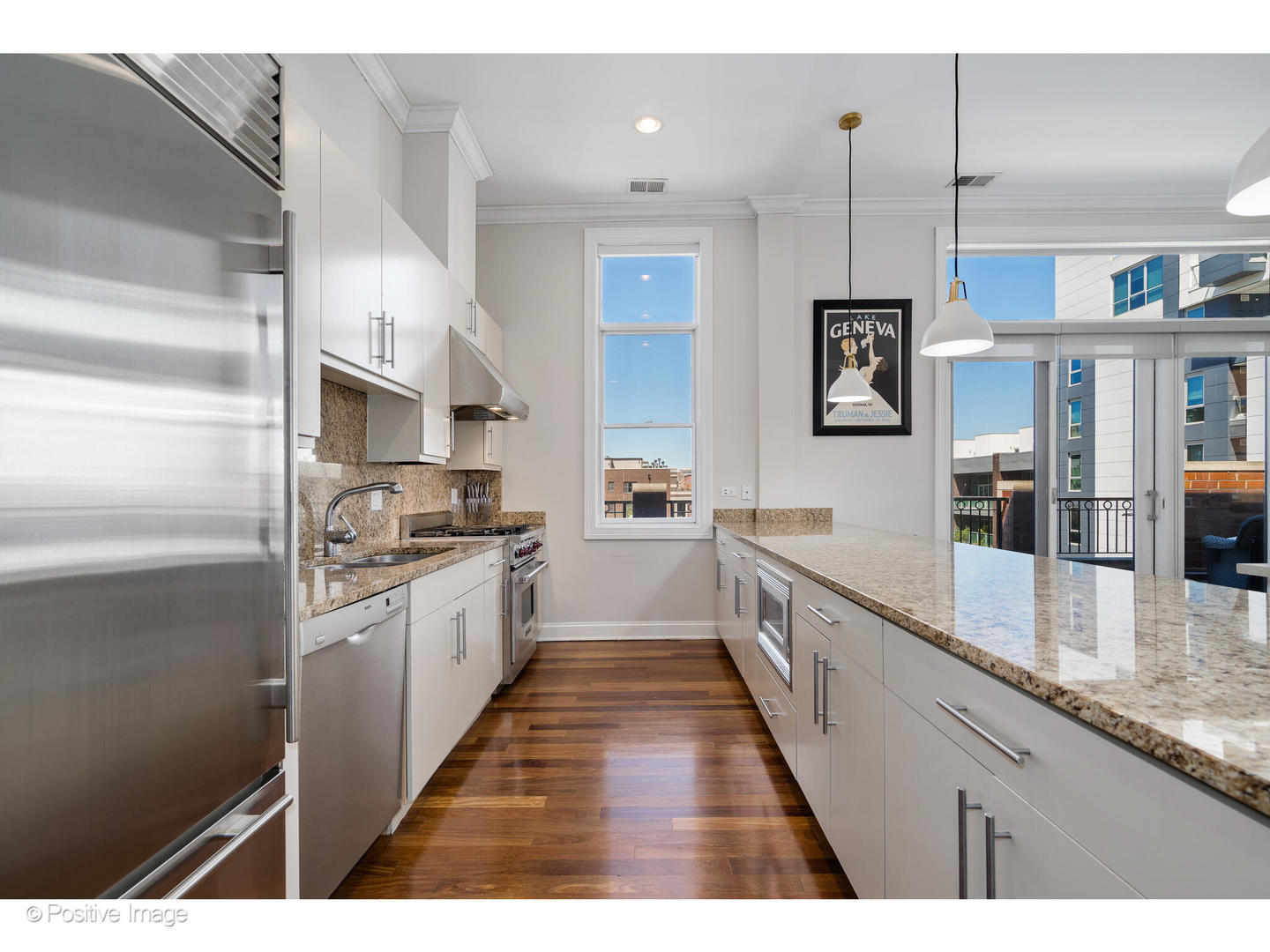 955 West Monroe Street, Unit 4A Chicago, IL 60607 - Photo 6 of 24 a large kitchen with granite countertop lots of counter top space