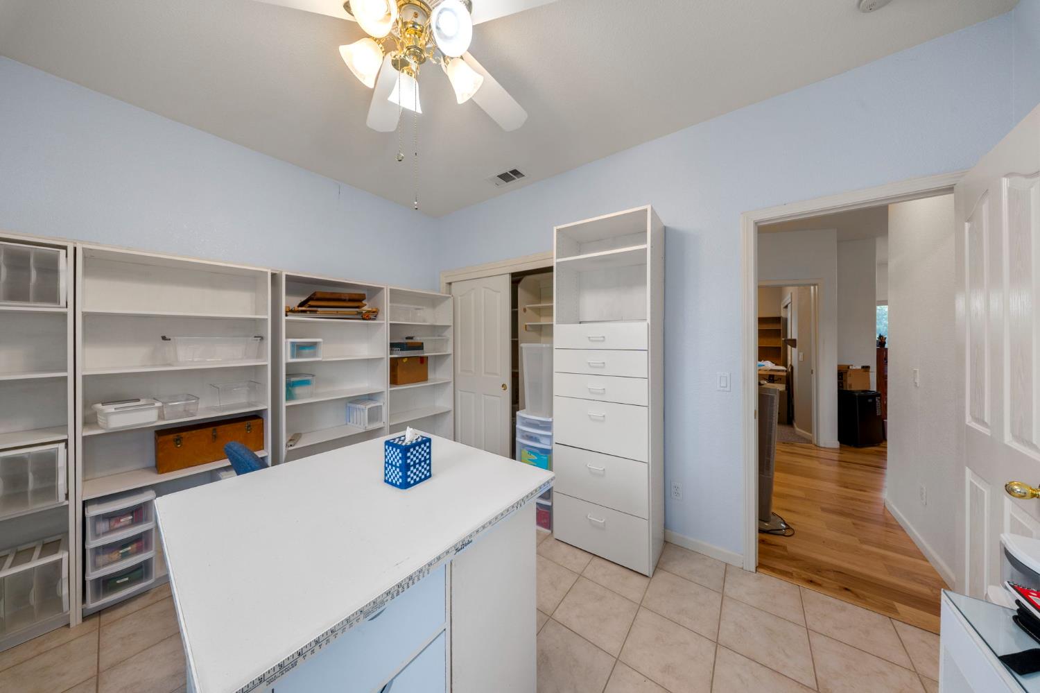 2101 Arabian Way Turlock, CA 95380 - Photo 29 of 38 a kitchen that has a lot of cabinets in it