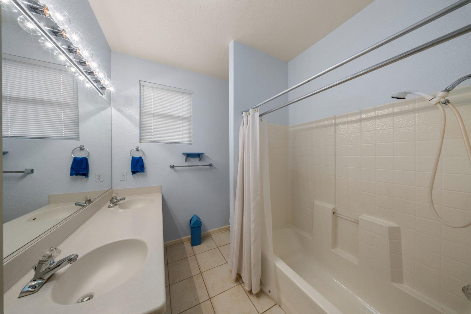 2101 Arabian Way Turlock, CA 95380 - Photo 30 of 38 a bathroom with a sink and a tub