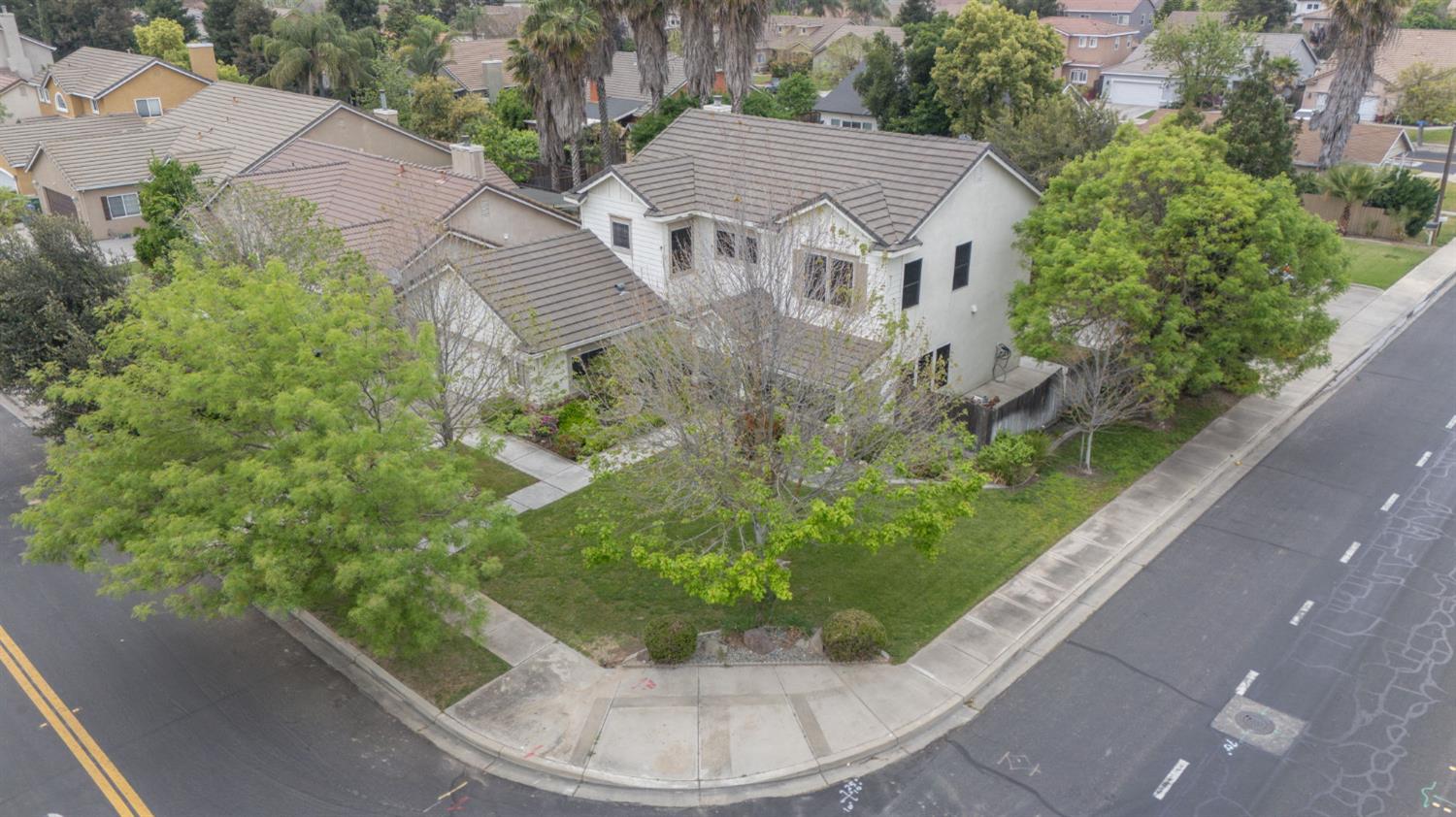 2101 Arabian Way Turlock, CA 95380 - Photo 5 of 38 a view of a house with a yard