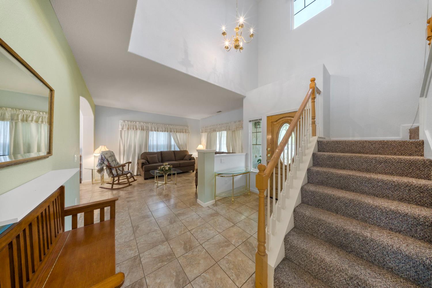 2101 Arabian Way Turlock, CA 95380 - Photo 10 of 38 a view of entryway livingroom and hall