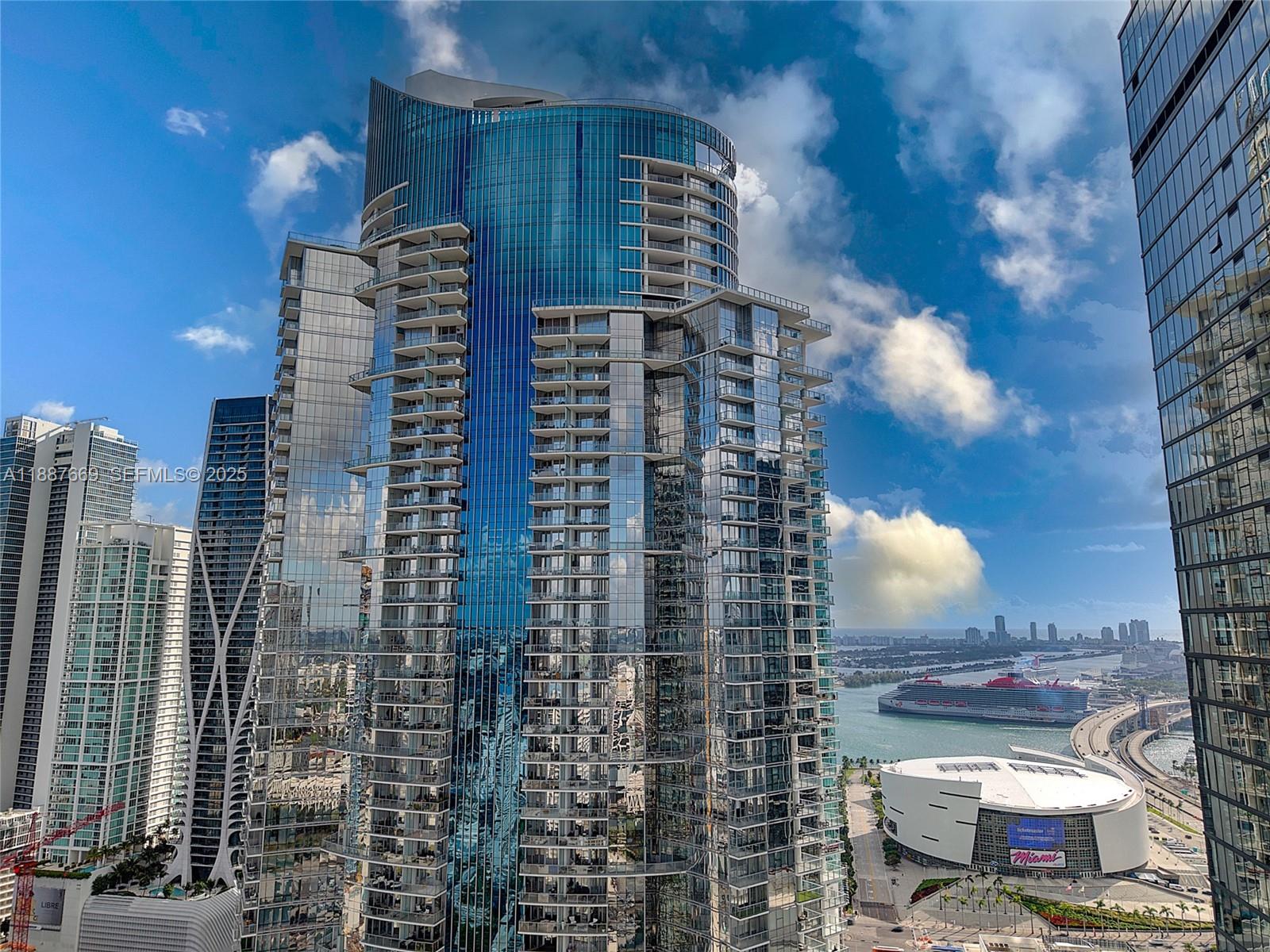 851 Northeast 1st Avenue, Unit 2802 Miami, FL 33132 - Photo 47 of 50 a view of a city with tall buildings