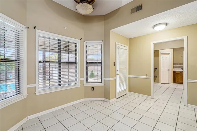 a kitchen with a stove a sink and a refrigerator