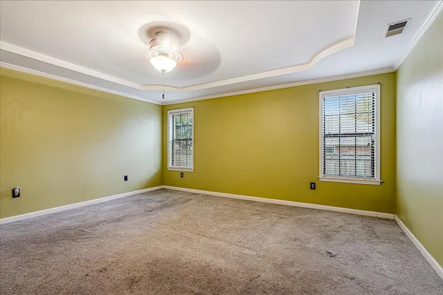 a bath tub sitting next to a bathroom sink