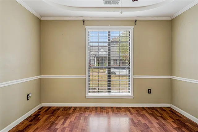 a kitchen with stainless steel appliances granite countertop a sink and cabinets