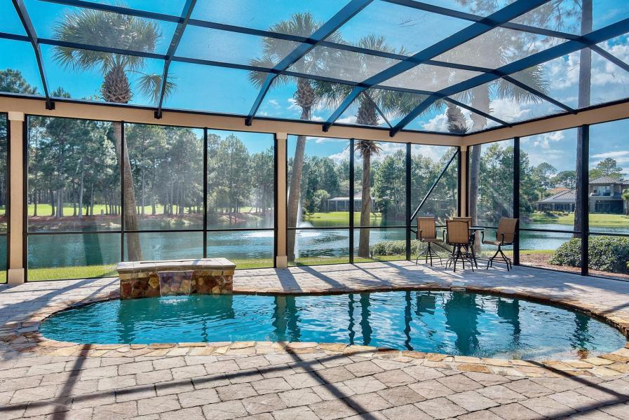 2918 Sand Pine Road Miramar Beach, FL 32550 - Photo 7 of 25 a swimming pool with lawn chairs and outdoor seating