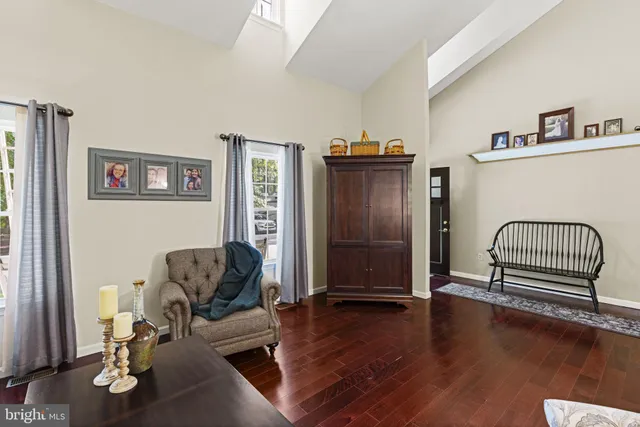 a view of a livingroom with furniture and wooden floor