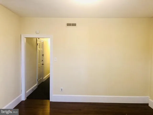 a view of small space with wooden floor