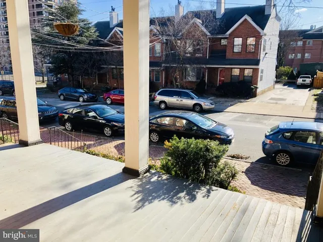 a view of a street with cars