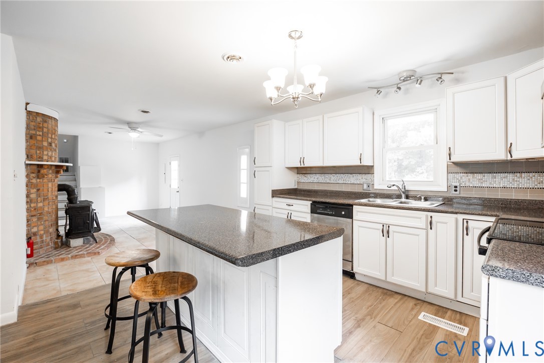 9016 Robin Road Disputanta, VA 23842 - Photo 6 of 30 Kitchen opens into Family Room