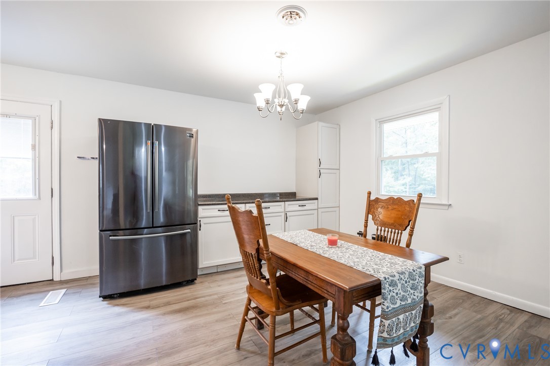 9016 Robin Road Disputanta, VA 23842 - Photo 7 of 30 Dining space featuring lbuilt-in Cabinets