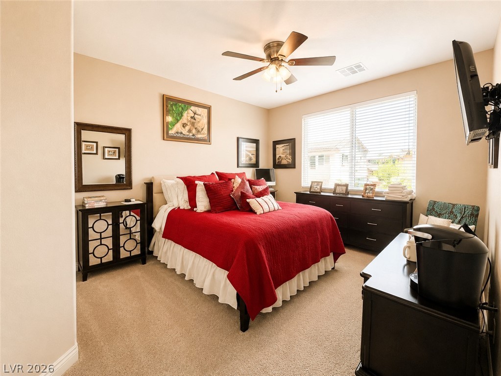 9724 University Ridge Avenue Las Vegas, NV 89149 - Photo 55 of 61 Plush carpeting and abundant natural light create a peaceful and inviting private retreat.