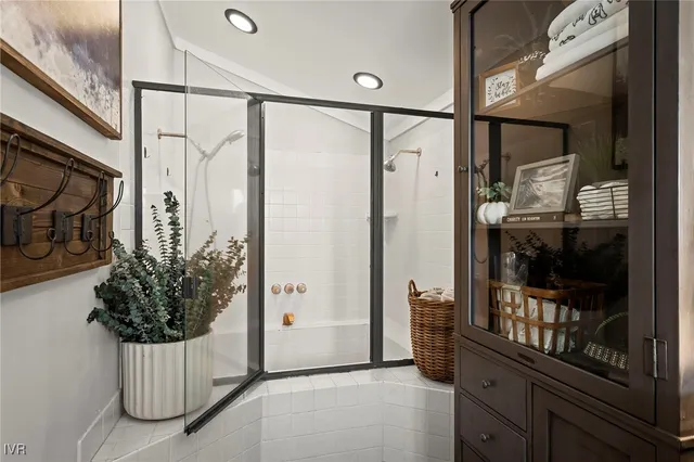 a view of a garden with large trees