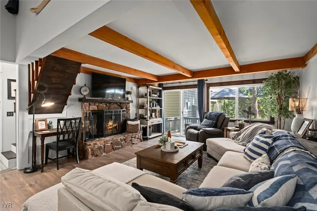 a kitchen with stainless steel appliances a sink and a stove