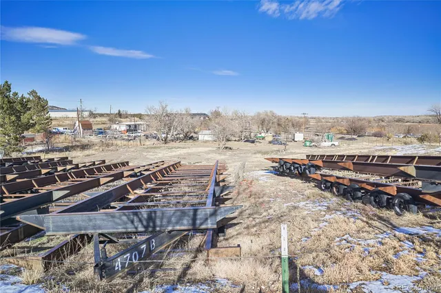 a view of a garden with a houses
