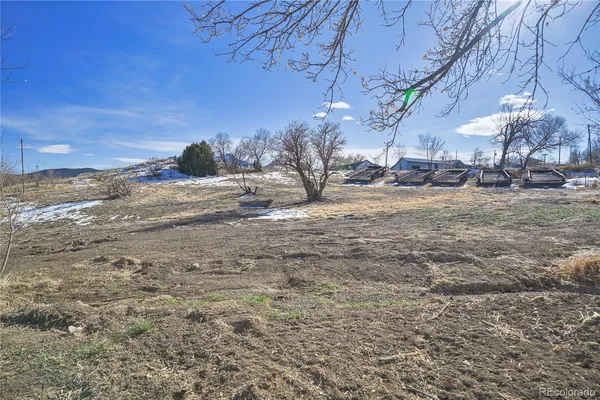 a view of a backyard of a house