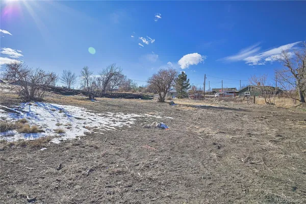 a view of a snow on the side of the road