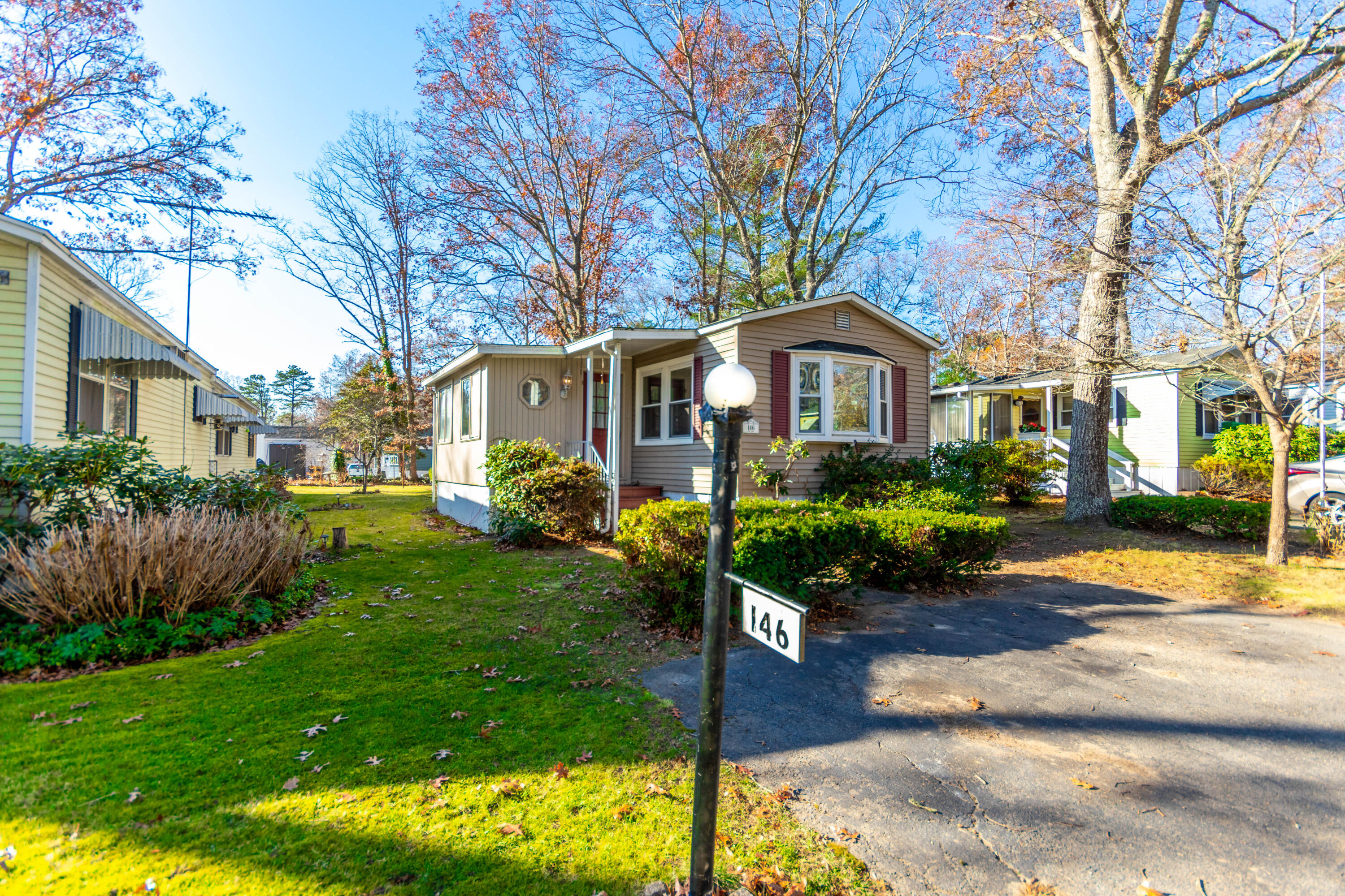 146 Windswept Road West Wareham, MA 02576 - Photo 1 of 30 a front view of a house with a garden and plants