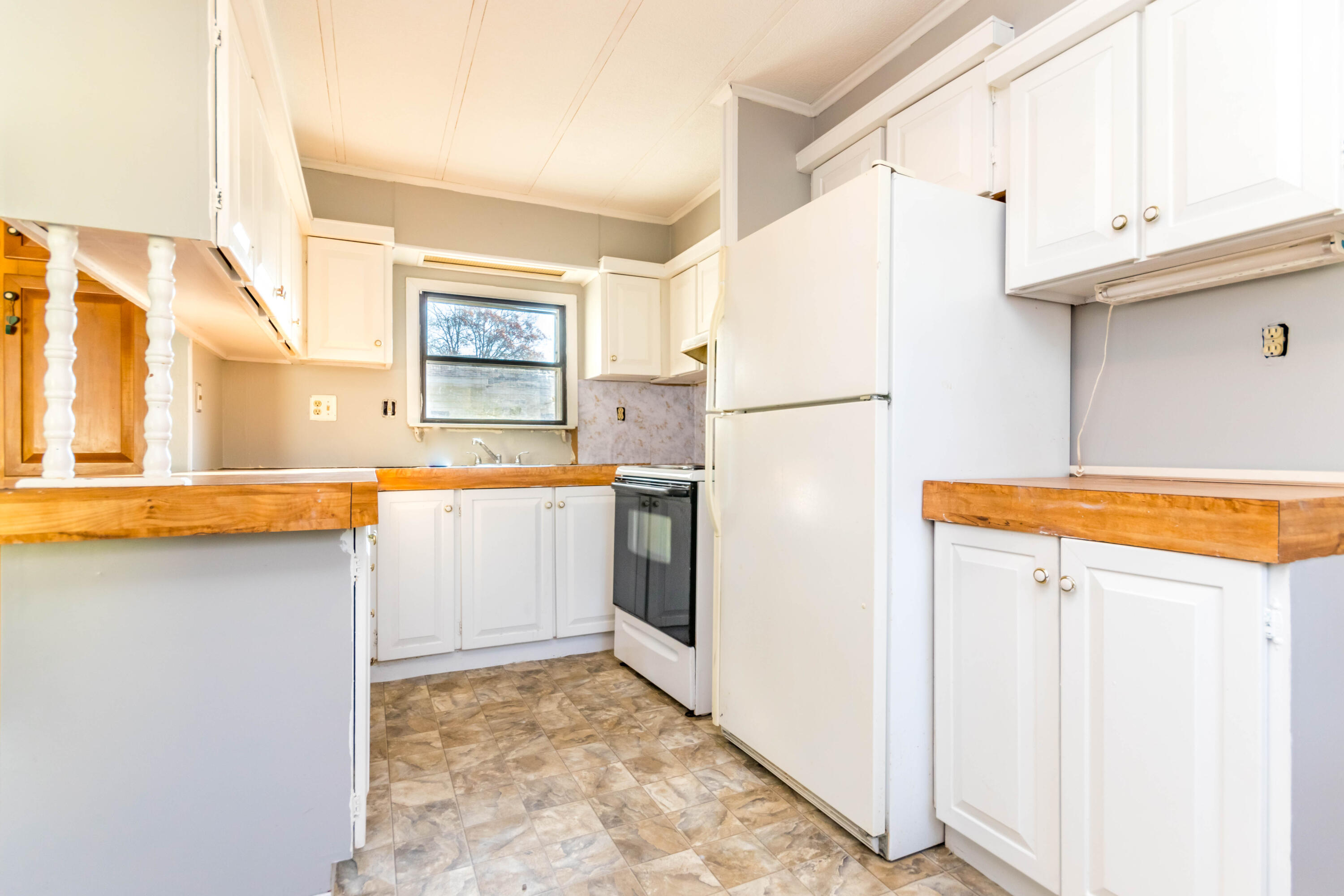 146 Windswept Road West Wareham, MA 02576 - Photo 13 of 30 a white refrigerator freezer sitting inside of a kitchen