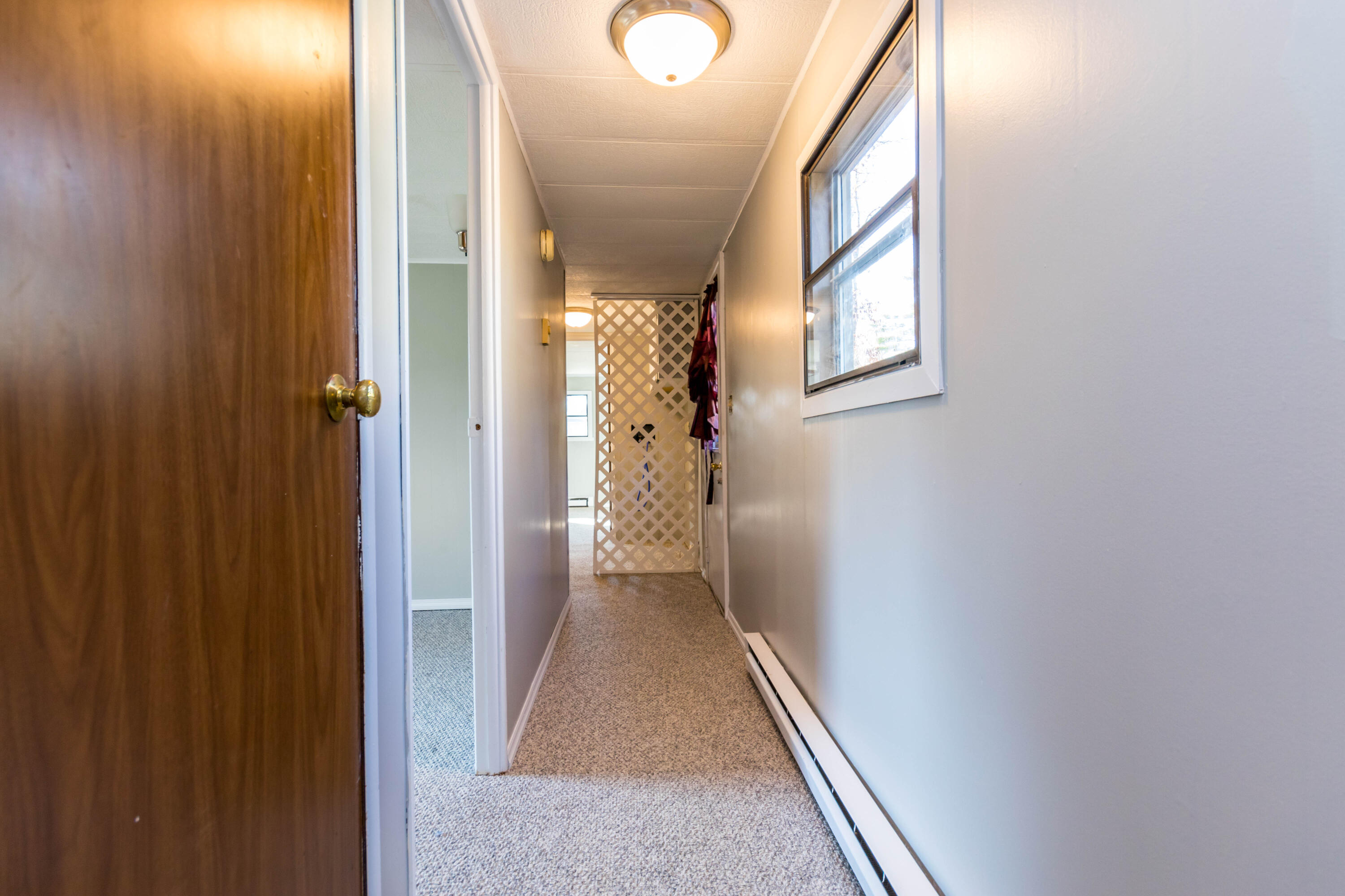 146 Windswept Road West Wareham, MA 02576 - Photo 15 of 30 a view of a hallway with windows and entryway