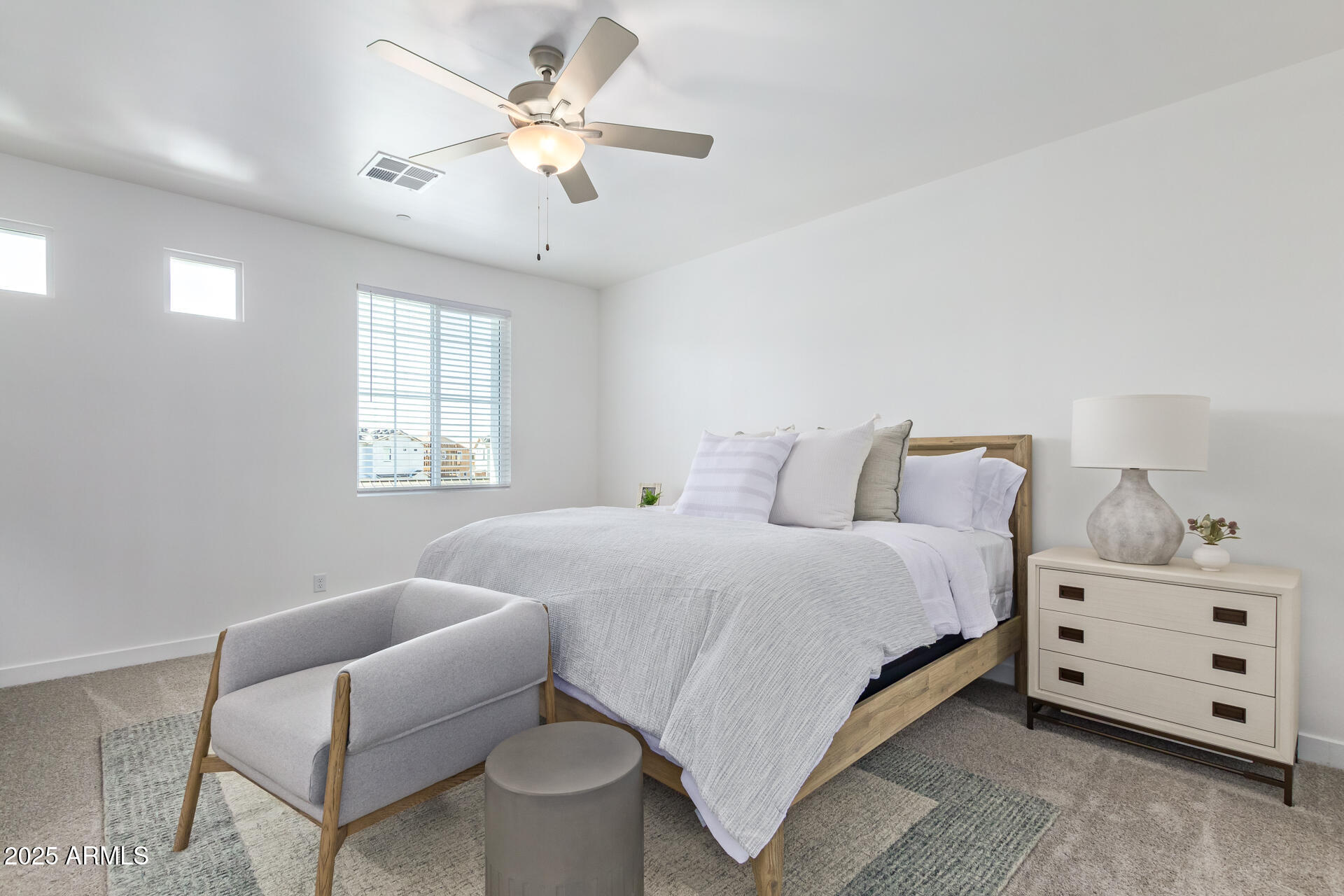3230 East Thomas Road, Unit 184 Mesa, AZ 85213 - Photo 15 of 30 a bedroom with bed and window
