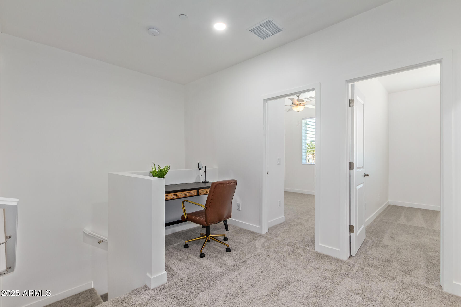 3230 East Thomas Road, Unit 184 Mesa, AZ 85213 - Photo 25 of 30 a view of a workspace with furniture