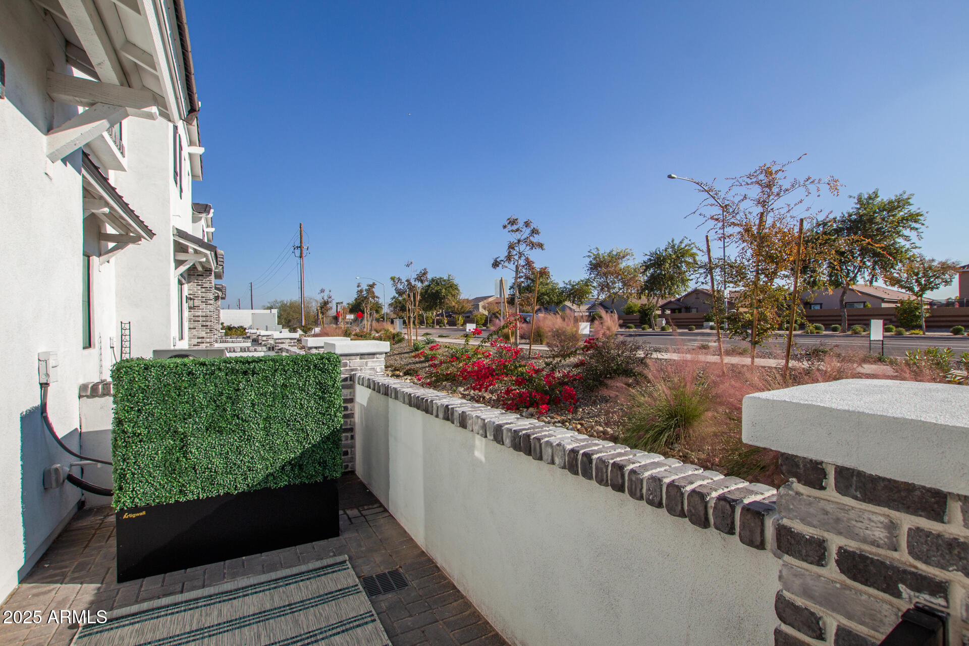 3230 East Thomas Road, Unit 184 Mesa, AZ 85213 - Photo 2 of 30 a view of a couch in front of a building