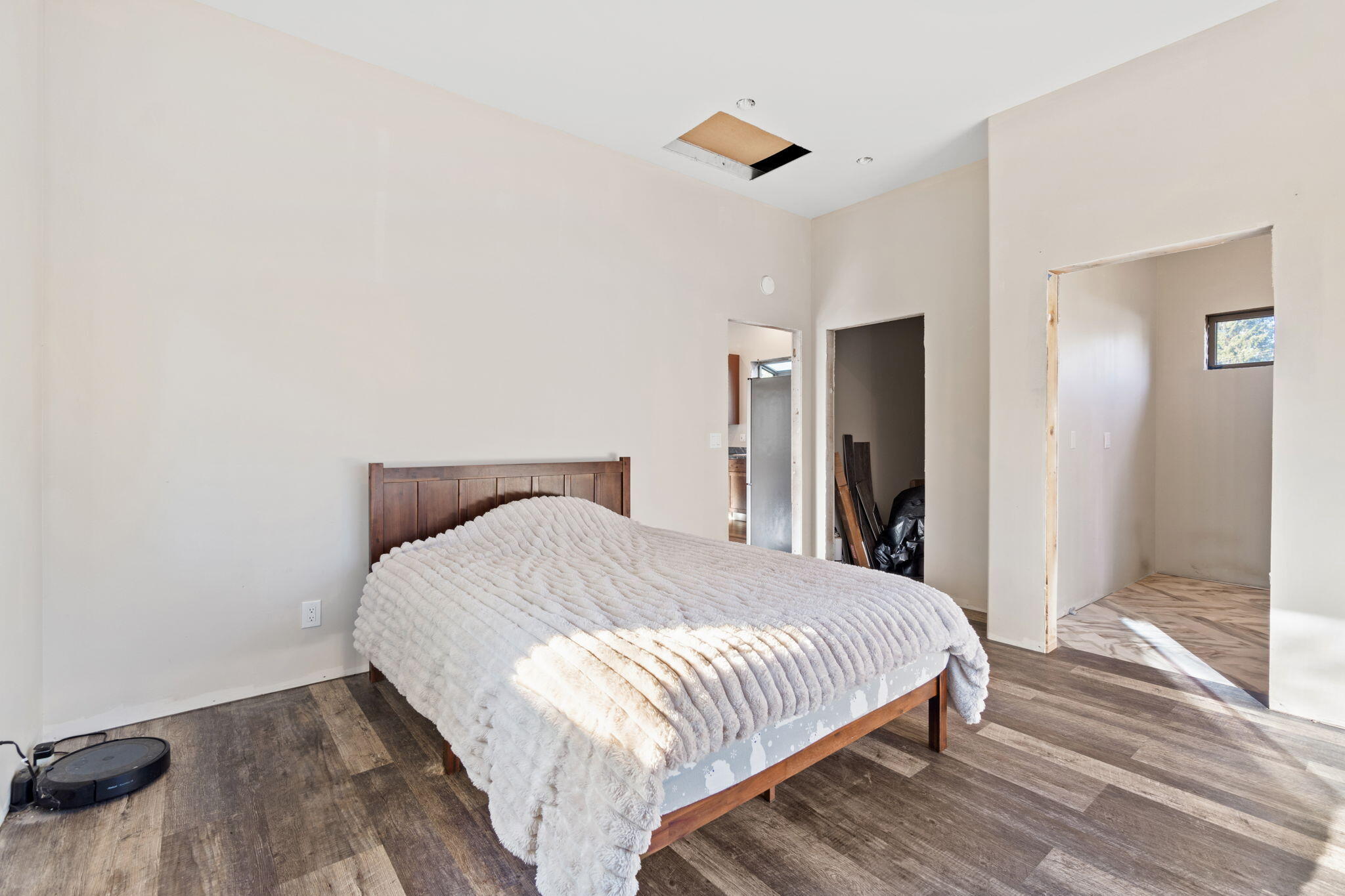61 Kingston Road Fieldbrook, CA 95519 - Photo 15 of 48 a bedroom with a bed and a wooden floor