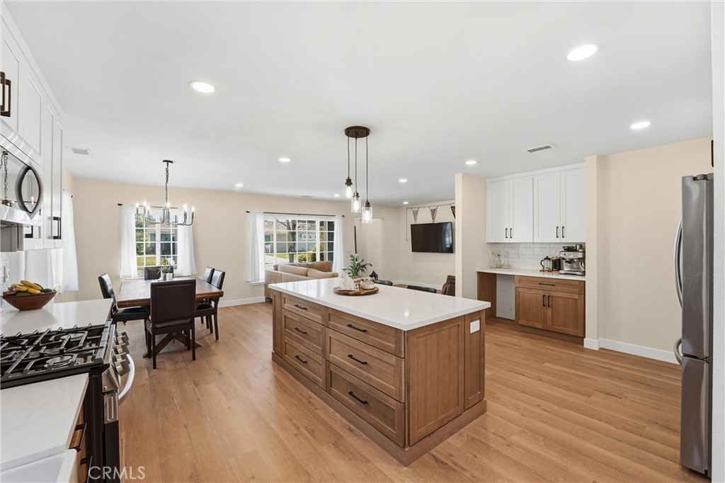 329 Catalpa Avenue Brea, CA 92821 - Photo 26 of 27 Open concept floor plan with natural light throughout. Neutral toned flooring and paint.