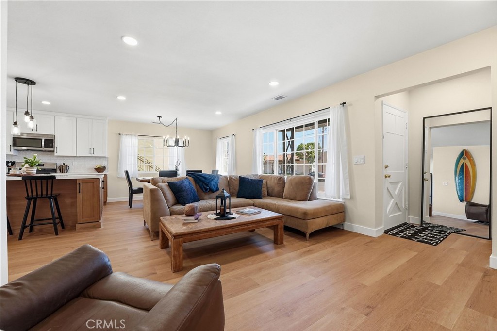 329 Catalpa Avenue Brea, CA 92821 - Photo 3 of 27 Living and dining rooms sits off the large kitchen and have large windows which provide great natural light and views of the neighborhood!