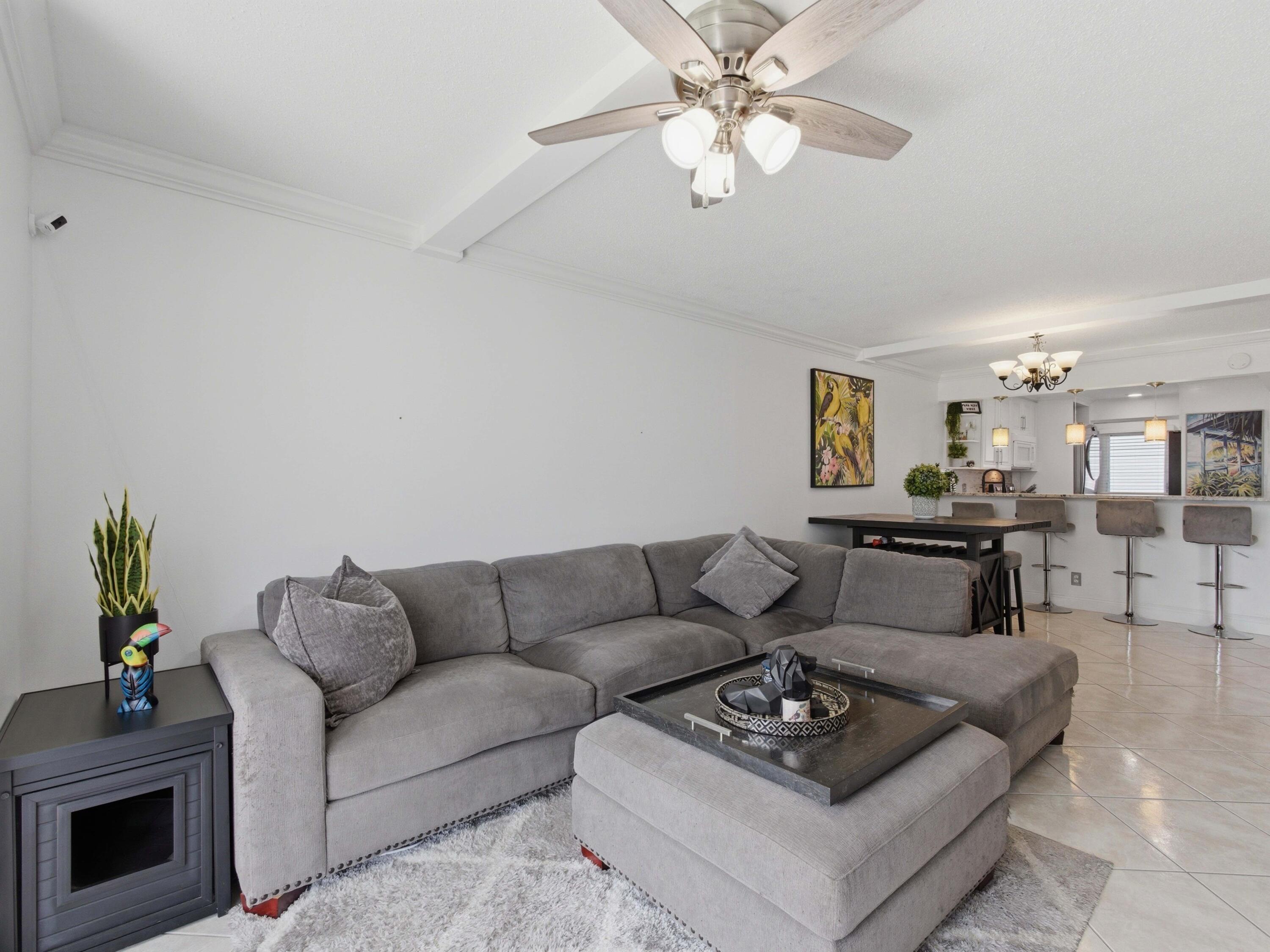 5700 Northwest 2nd Avenue, Unit 108 Boca Raton, FL 33487 - Photo 17 of 38 Living to Dining