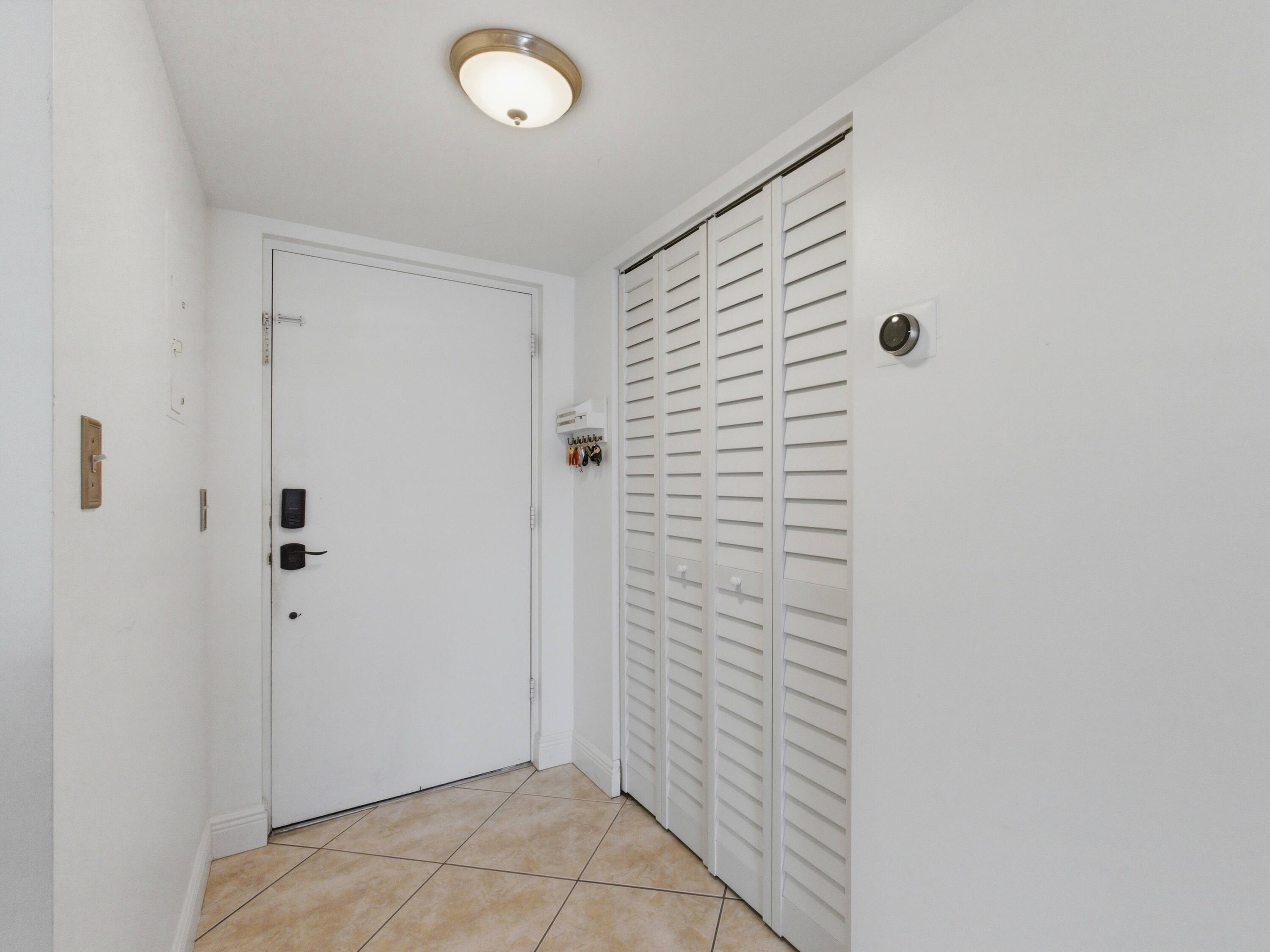5700 Northwest 2nd Avenue, Unit 108 Boca Raton, FL 33487 - Photo 5 of 38 Foyer