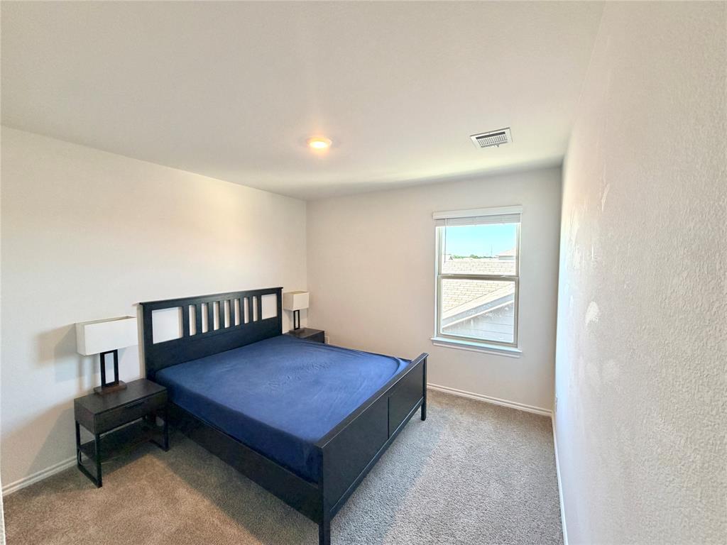 816 Country Road Royse City, TX 75189 - Photo 11 of 24 Carpeted room featuring a single window with blinds and white trim