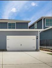315 Marsh Lane Princeton, TX 75407 - Photo 1 of 20 a front view of a house with a garage