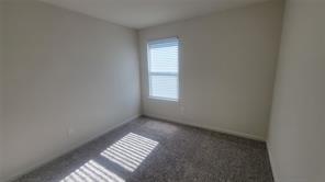 315 Marsh Lane Princeton, TX 75407 - Photo 15 of 20 a view of an empty room with a window